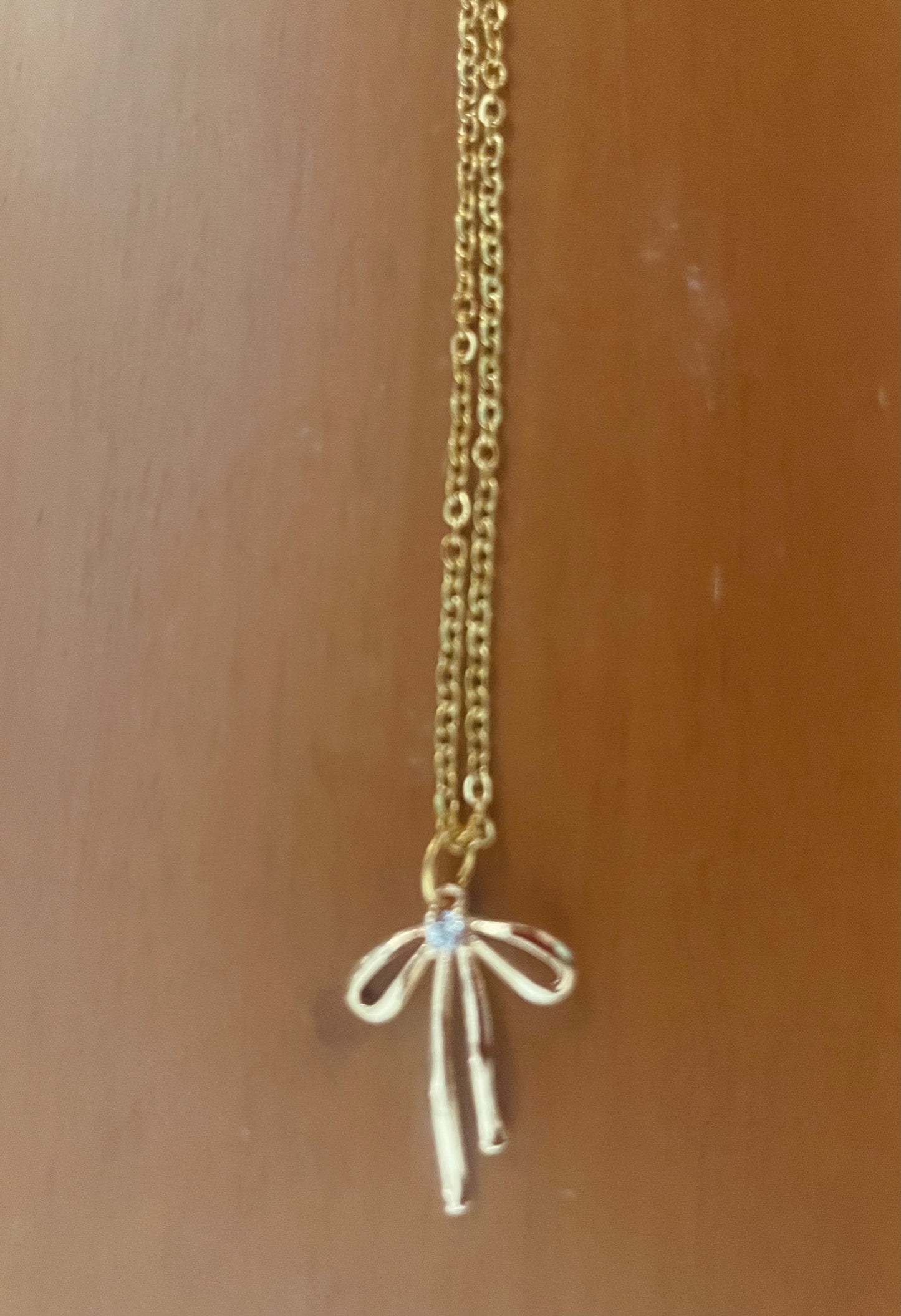 8). Cottage Collection: The Bow Necklace.